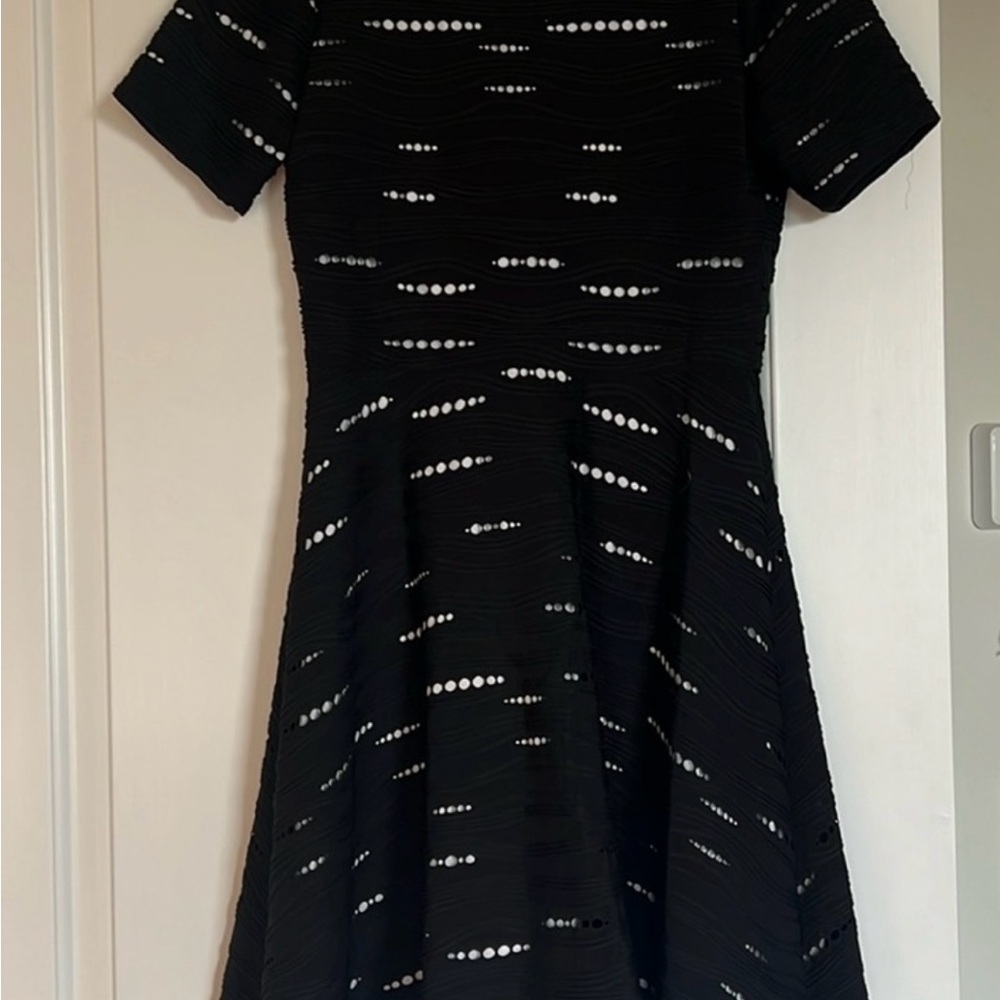 Donna Morgan Fit/Flare dress with cutouts and white underneath, size 2